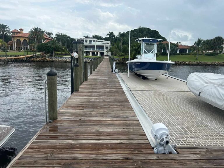 Dock with boat lift at luxury waterfront property